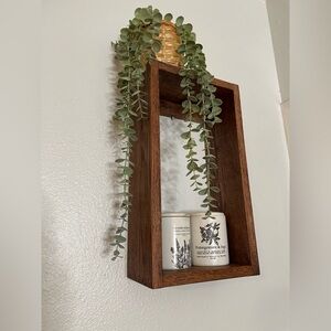 Rustic Brown Wall Shelf with Greenery